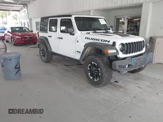2024 Jeep Wrangler Rubicon X z VIN 1C4RJXR65RW211676, wystawiony jako IAAI lot #42359215 z przebiegiem 3 143 mil mil oraz . Historia ofert i sprzedaży dostępna na DreamBid. Obrazek 1.