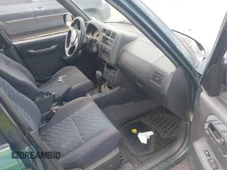 1998 Toyota RAV4 with VIN JT3GP10V5W0026814, listed as a IAAI auction lot 42003456 with 196,842 mi miles and . Bid and sale history available at DreamBid. Image 5.