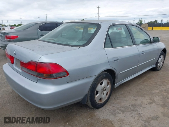 2001 Honda Accord EX z VIN 1HGCG16571A010751, wystawiony jako IAAI lot #42074284 z przebiegiem 281 526 mil mil oraz . Historia ofert i sprzedaży dostępna na DreamBid. Obrazek 4.