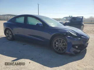 2022 Tesla Model 3 Long Range with VIN 5YJ3E1EB6NF249443, listed as a Copart auction lot 42940215 with Not Provided miles and Salvage Title. Bid and sale history available at DreamBid. Image 4.