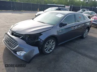 2015 Toyota Avalon Limited with VIN 4T1BK1EB4FU162164, listed as a IAAI auction lot 42041070 with 176,167 mi miles and . Bid and sale history available at DreamBid. Image 2.