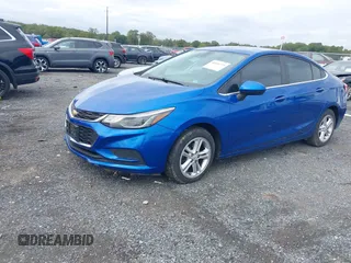 2016 Chevrolet Cruze LT z VIN 1G1BE5SM5G7321470, wystawiony jako IAAI lot #40456371 z przebiegiem 90 350 mil mil oraz . Historia ofert i sprzedaży dostępna na DreamBid. Obrazek 2.