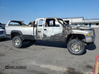 1998 Dodge 2500 with VIN 1B7KF2365WJ215346, listed as a Copart auction lot 77669924 with Not Provided miles and Clean Title. Bid and sale history available at DreamBid. Image 4.