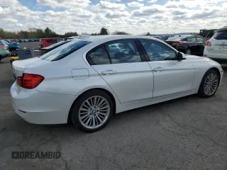 2015 BMW 3 Series 328i xDrive with VIN WBA3B5G54FNS11989, listed as a Copart auction lot 52485505 with 134,230 mi miles and Salvage Title. Bid and sale history available at carsss.com. Image 3.