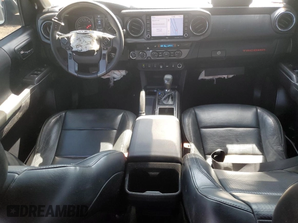 2021 Toyota Tacoma SR5 with VIN 3TMDZ5BN9MM099515, listed as a Copart auction lot 56687385 with 66,721 mi miles and Salvage title. Bid and sale history available at DreamBid. Image 8.