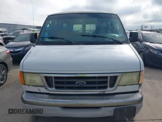 2003 Ford Econoline Passenger XL with VIN 1FDSS31L13HB83911, listed as a IAAI auction lot 42213376 with 236,989 mi miles. Bid and sale history available at carsss.com. Image 12.