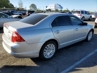 2010 Ford Fusion Hybrid с VIN 3FADP0L31AR258408, выставлен на аукционе Copart как лот 46703935 с пробегом 151 402 миль миль и Списание • Salvage title. История ставок и продаж доступна на DreamBid. Изображение 3.