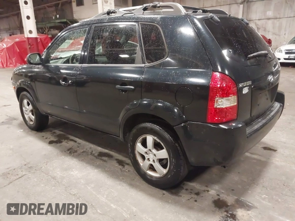 2006 Hyundai Tucson GL with VIN KM8JM12B26U325338, listed as a IAAI auction lot 41809578 with 127,210 mi miles. Bid and sale history available at carsss.com. Image 3.