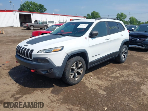 2014 Jeep Cherokee Trailhawk z VIN 1C4PJMBS0EW188976, wystawiony jako IAAI lot #42587233 z przebiegiem 191 670 mil mil oraz . Historia ofert i sprzedaży dostępna na DreamBid. Obrazek 17.