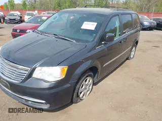 2012 Chrysler Town & Country Touring with VIN 2C4RC1BG8CR326041, listed as a IAAI auction lot 42137341 with 112,026 mi miles. Bid and sale history available at carsss.com. Image 12.