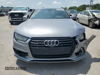 2016 Audi A7 3.0 Prestige with VIN WAU2GAFC4GN029233, listed as a Copart auction lot 61023963 with 163,562 mi miles. Bid and sale history available at carsss.com. Image 5.