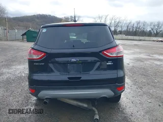 2013 Ford Escape SE with VIN 1FMCU9GX9DUD34661, listed as a IAAI auction lot 41945565 with 239,752 mi miles and . Bid and sale history available at DreamBid. Image 16.