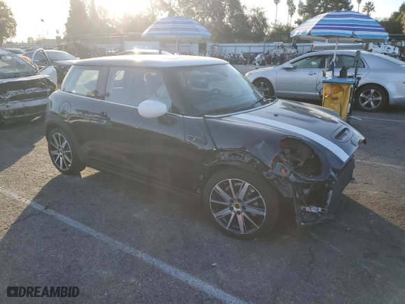 2023 MINI Hardtop 2 Door Cooper SE Signature with VIN WMW13DJ01P2T89065, listed as a Copart auction lot 85043254 with 9,737 mi miles and Salvage Title. Bid and sale history available at carsss.com. Image 4.