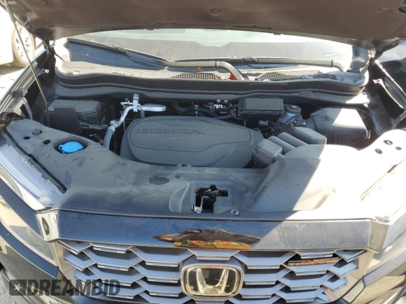 2024 Honda Passport TrailSport z VIN 5FNYF8H67RB010869, wystawiony jako Copart lot #50761425 z przebiegiem 5 720 mil mil oraz Szkoda całkowita • Salvage title. Historia ofert i sprzedaży dostępna na DreamBid. Obrazek 12.