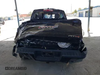 2021 GMC Canyon 4WD AT4 w/Cloth with VIN 1GTG6FEN0M1273816, listed as a Copart auction lot 65976804 with 28,082 mi miles and Salvage Title. Bid and sale history available at carsss.com. Image 6.