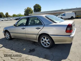 1998 Mercedes-Benz C 230/260/280/320 with VIN WDBHA23G4WA564563, listed as a Copart auction lot 71414284 with 277,741 mi miles and Salvage Title. Bid and sale history available at carsss.com. Image 2.
