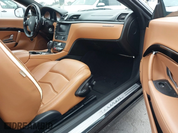 2014 Maserati GranTurismo Sport with VIN ZAM45MMA4E0078412, listed as a IAAI auction lot 42239631 with 31,392 mi miles and . Bid and sale history available at DreamBid. Image 5.