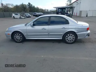 2003 Hyundai Sonata GLS with VIN KMHWF35H93A897855, listed as a IAAI auction lot 41527610 with 122,010 mi miles. Bid and sale history available at carsss.com. Image 14.