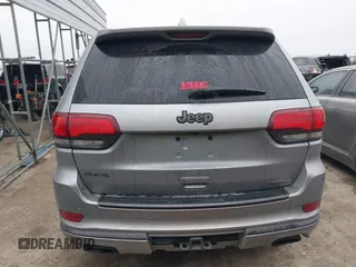 2018 Jeep Grand Cherokee High Altitude with VIN 1C4RJFCG4JC360338, listed as a IAAI auction lot 41250674 with 83,924 mi miles. Bid and sale history available at carsss.com. Image 17.