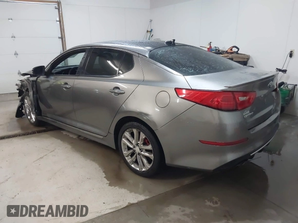 2014 Kia Optima SX Turbo with VIN 5XXGR4A61EG316334, listed as a IAAI auction lot 41684077 with 179,212 mi miles and . Bid and sale history available at DreamBid. Image 3.