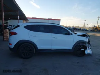 2017 Hyundai Tucson Value with VIN KM8J33A27HU541527, listed as a IAAI auction lot 41382244 with 65,848 mi miles. Bid and sale history available at carsss.com. Image 13.