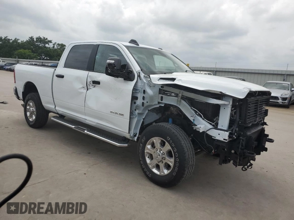 2024 Ram 2500 Big Horn with VIN 3C6UR5DL9RG156353, listed as a Copart auction lot 74147574 with 4,875 mi miles and Salvage title. Bid and sale history available at DreamBid. Image 4.