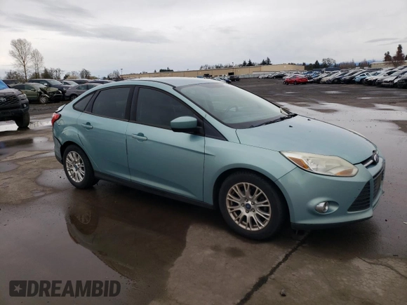 2012 Ford Focus SE with VIN 1FAHP3F21CL142407, listed as a Copart auction lot 48551205 with 174,935 mi miles and Salvage Title. Bid and sale history available at carsss.com. Image 4.
