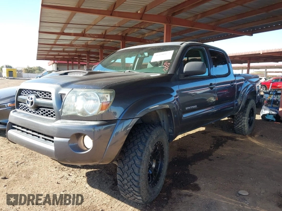 2011 Toyota Tacoma with VIN 3TMMU4FN0BM032561, listed as a IAAI auction lot 41190472 with 188,862 mi miles and . Bid and sale history available at DreamBid. Image 2.