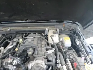 2023 Jeep Wrangler Sport with VIN 1C4HJXDG1PW643805, listed as a Copart auction lot 68821705 with 55,154 mi miles and Salvage title. Bid and sale history available at DreamBid. Image 15.