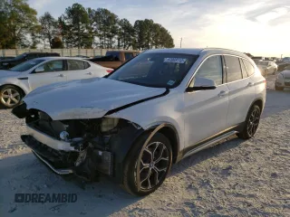 2020 BMW X1 xDrive28i with VIN WBXJG9C02L3L57542, listed as a Copart auction lot 67003112 with 18,619 mi miles. Bid and sale history available at carsss.com. Image 2.