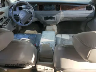 1999 Lincoln Town Car Executive z VIN 1LNHM81W4XY714116, wystawiony jako Copart lot #44424595 z przebiegiem 210 041 mil mil oraz Szkoda całkowita • Salvage title. Historia ofert i sprzedaży dostępna na DreamBid. Obrazek 8.