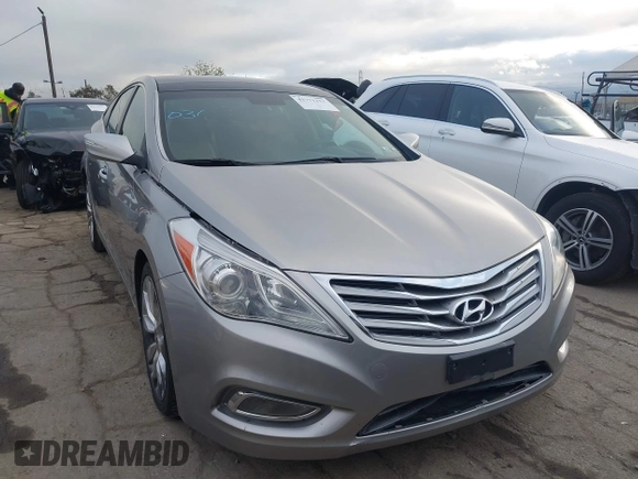 2012 Hyundai Azera with VIN KMHFH4JG8CA157582, listed as a IAAI auction lot 41771113 with 113,392 mi miles and . Bid and sale history available at carsss.com. Image 1.