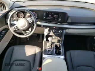 2023 Kia Carnival LX with VIN KNDNB4H35P6260181, listed as a Copart auction lot 74240714 with 6,879 mi miles and Salvage Title. Bid and sale history available at carsss.com. Image 8.