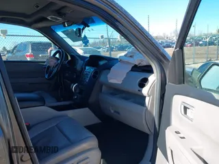 2010 Honda Pilot Touring with VIN 5FNYF4H93AB008589, listed as a IAAI auction lot 41731084 with 138,554 mi miles and . Bid and sale history available at carsss.com. Image 5.