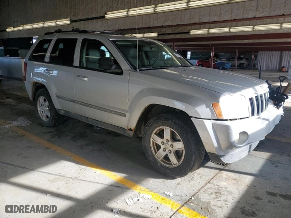 2007 Jeep Grand Cherokee Laredo with VIN 1J8GR48K67C652382, listed as a Copart auction lot 45310295 with 266,618 mi miles and Salvage Title. Bid and sale history available at carsss.com. Image 4.
