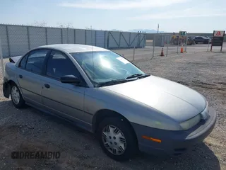1998 Saturn SL z VIN 1G8ZH5281WZ175176, wystawiony jako IAAI lot #41991139 z przebiegiem 214 374 mil mil oraz . Historia ofert i sprzedaży dostępna na DreamBid. Obrazek 1.