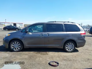 2013 Toyota Sienna XLE with VIN 5TDDK3DC0DS059036, listed as a IAAI auction lot 42069896 with 124,105 mi miles and . Bid and sale history available at DreamBid. Image 14.