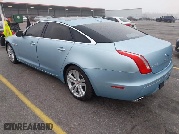 2013 Jaguar XJ with VIN SAJWA2G13DLV57881, listed as a IAAI auction lot 41478667 with 73,764 mi miles. Bid and sale history available at carsss.com. Image 3.