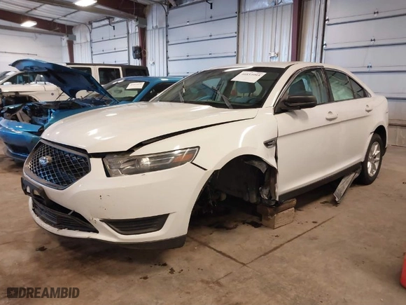 2014 Ford Taurus SE with VIN 1FAHP2D89EG178858, listed as a IAAI auction lot 40853995 with 136606 miles. Bid and sale history available at carsss.com. Image 2.