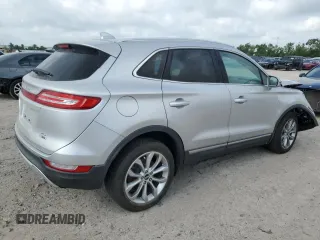 2016 Lincoln MKC Select z VIN 5LMCJ2C9XGUJ05222, wystawiony jako Copart lot #55500735 z przebiegiem 104 831 mil mil oraz Szkoda całkowita • Salvage title. Historia ofert i sprzedaży dostępna na DreamBid. Obrazek 3.