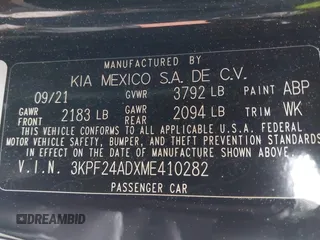 2021 Kia Forte LXS with VIN 3KPF24ADXME410282, listed as a IAAI auction lot 42004328 with 62,817 mi miles. Bid and sale history available at carsss.com. Image 9.