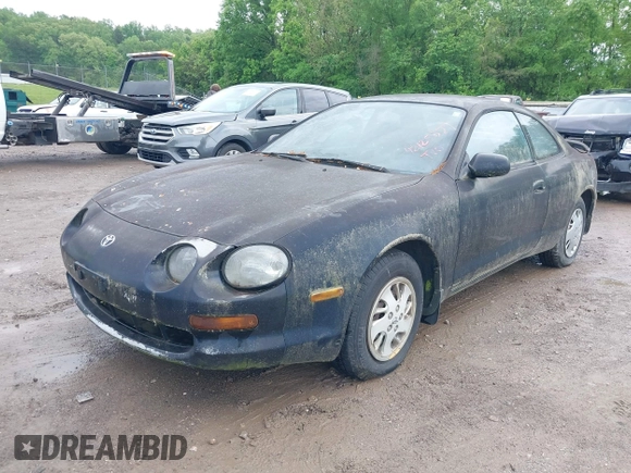 1995 Toyota Celica ST with VIN JT2AT00F7S0040443, listed as a IAAI auction lot 42125327 with 286,767 mi miles. Bid and sale history available at carsss.com. Image 2.
