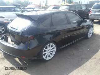 2008 Subaru Impreza Wagon (Natl) WRX w/Premium Pkg with VIN JF1GH75608G804076, listed as a IAAI auction lot 40553356 with 145,879 mi miles. Bid and sale history available at carsss.com. Image 4.