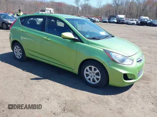 2014 Hyundai Accent GS with VIN KMHCT5AE0EU193502, listed as a IAAI auction lot 42036656 with 114,136 mi miles. Bid and sale history available at carsss.com. Image 1.