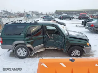 2000 Toyota 4Runner Limited with VIN JT3HN87R9Y0272795, listed as a IAAI auction lot 41370767 with 234,892 mi miles. Bid and sale history available at carsss.com. Image 14.