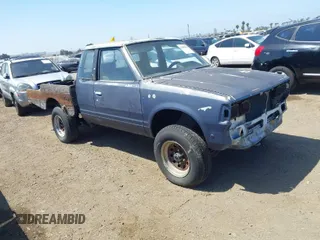1984 Datsun 720 z VIN JN6ND06Y1EW020315, wystawiony jako IAAI lot #42083962 z przebiegiem 187 143 mil mil oraz . Historia ofert i sprzedaży dostępna na DreamBid. Obrazek 1.