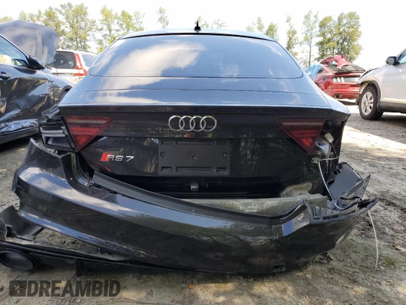 2016 Audi RS 7 Prestige z VIN WUAW2AFC7GN904309, wystawiony jako Copart lot #61766944 z przebiegiem 54 914 mil mil oraz Czysty tytuł • Clean title. Historia ofert i sprzedaży dostępna na DreamBid. Obrazek 6.