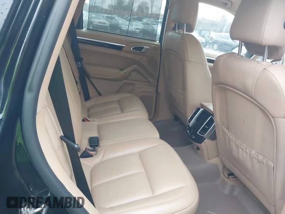 2016 Porsche Cayenne with VIN WP1AA2A28GLA06519, listed as a IAAI auction lot 41520326 with 144,828 mi miles. Bid and sale history available at carsss.com. Image 8.