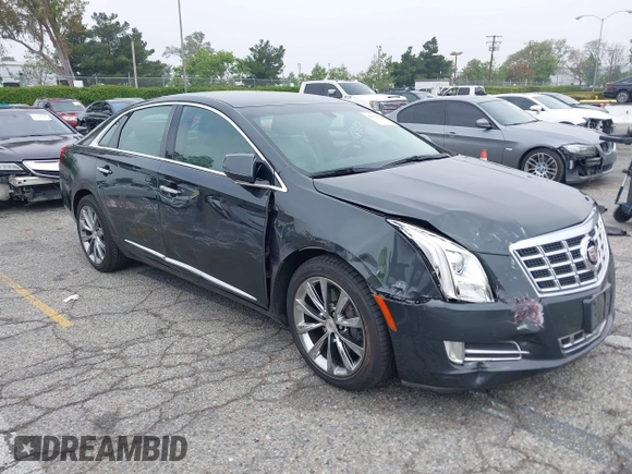 2013 Cadillac XTS Luxury with VIN 2G61P5S33D9215214, listed as a IAAI auction lot 42170402 with 132,045 mi miles and . Bid and sale history available at DreamBid. Image 6.