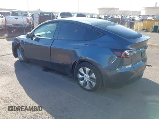 2023 Tesla Model Y Long Range with VIN 7SAYGDEE0PF928836, listed as a IAAI auction lot 41538742 with 9,630 mi miles and . Bid and sale history available at DreamBid. Image 3.